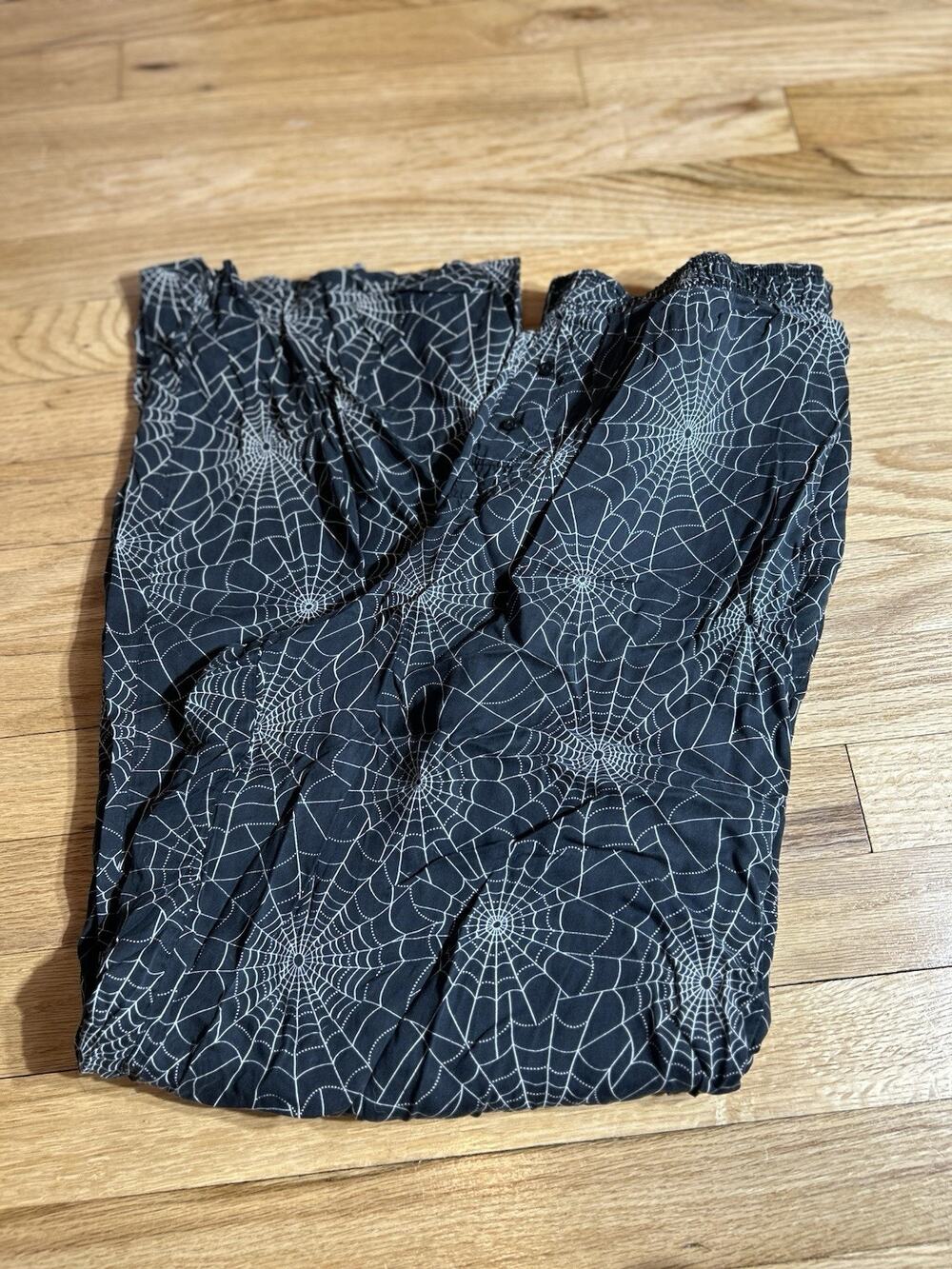 Victoria Secret all-over white dotted spiderweb pattern. Size M